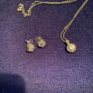 Silver necklace and earrings set.
